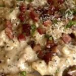 Creamy bacon parmesan pasta shells topped with crispy bacon, parmesan and parsley